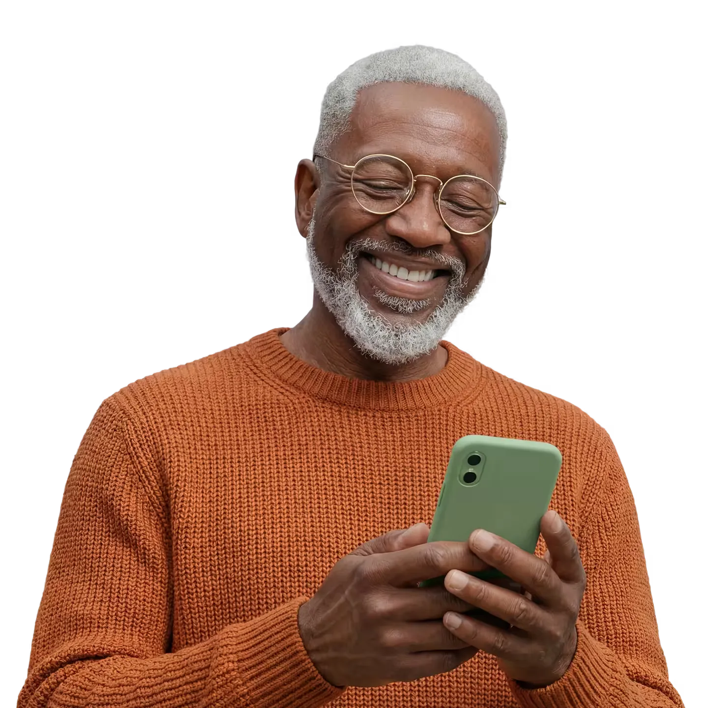 Smiling older man with gray hair and beard wearing round glasses and orange sweater looking at a green smartphone.